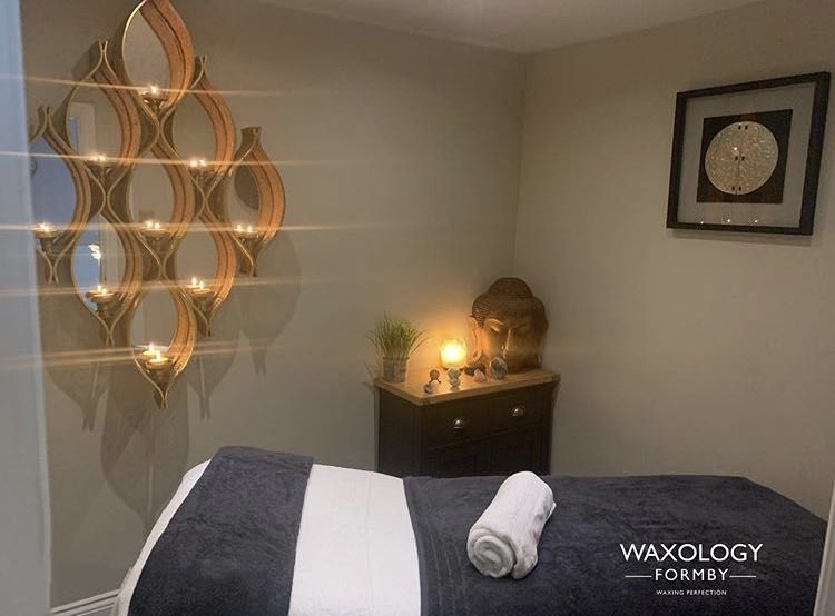 Candle-lit treatment room at Waxology, Formby